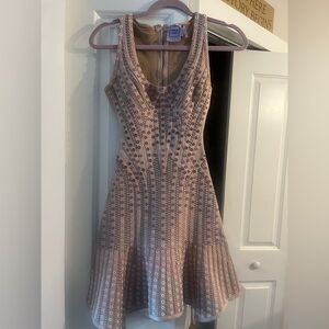 Original Herve Leger designer dress size XS
Tan with pink tan and white grommets